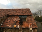 Pose d'un velux® sur une toiture nouvellement refaite